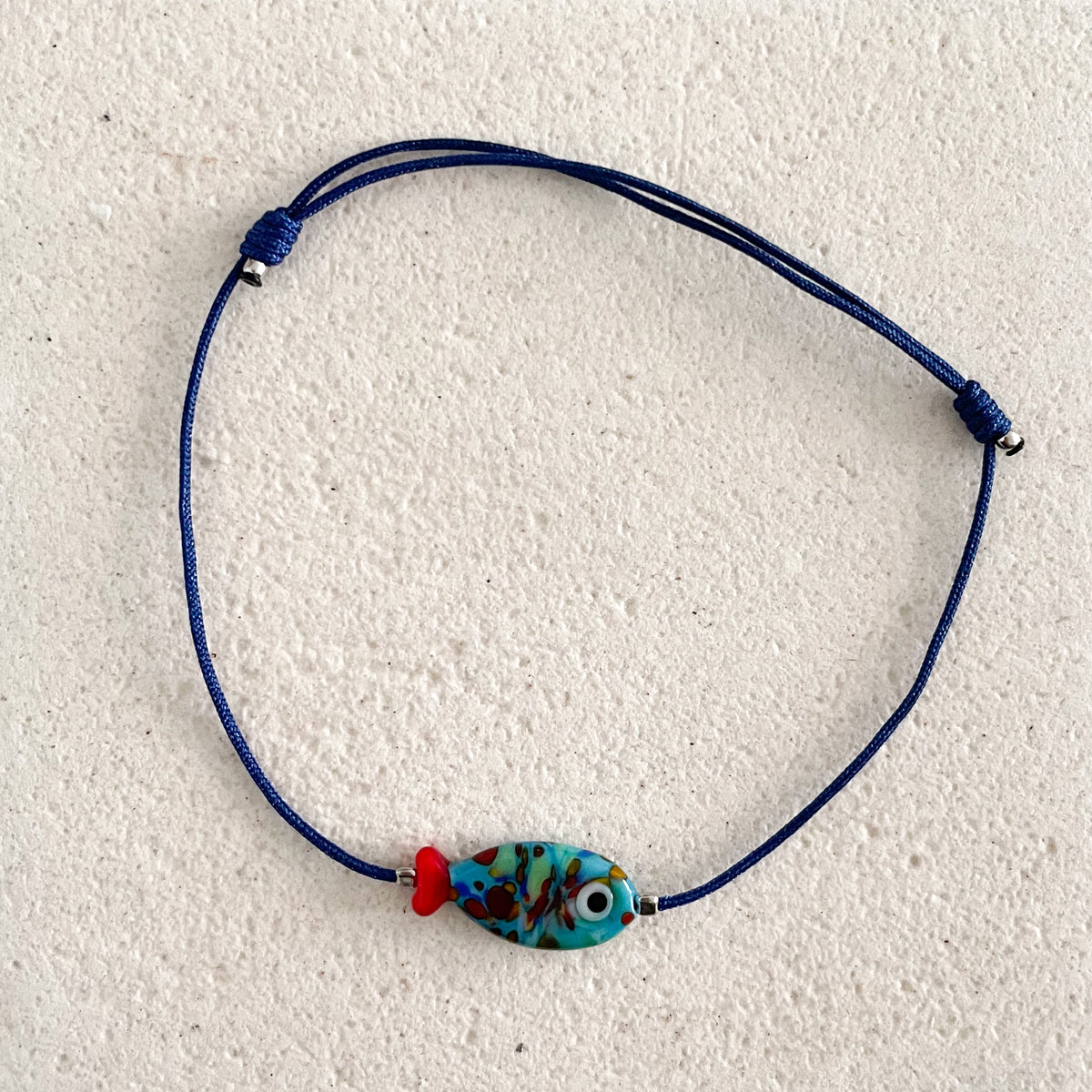 Bosporus-Fisch-Armband aus gestreiftem Glas